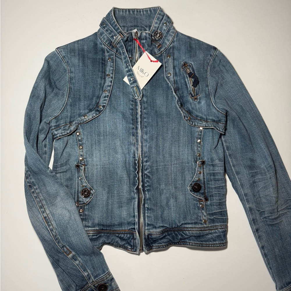 Blue denim jacket with silver studs and buttons. Handcrafted and handmade Jacket